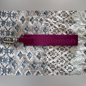 Lululemon Never Lost keychain, fuchsia/magenta color NWOT